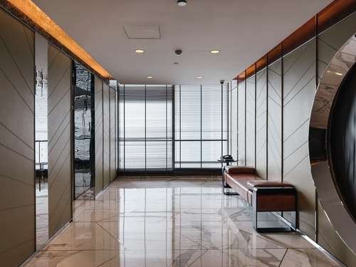 Part of Hotel lobby interior with commercial window shades and blinds