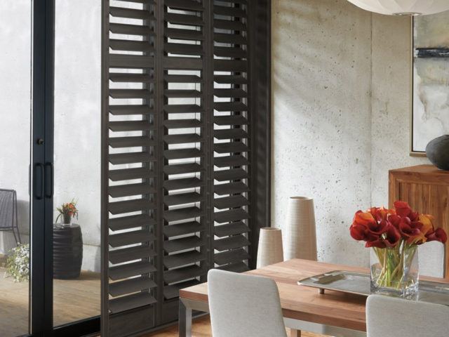 Newstyle™ Hybrid Shutters in a dining room