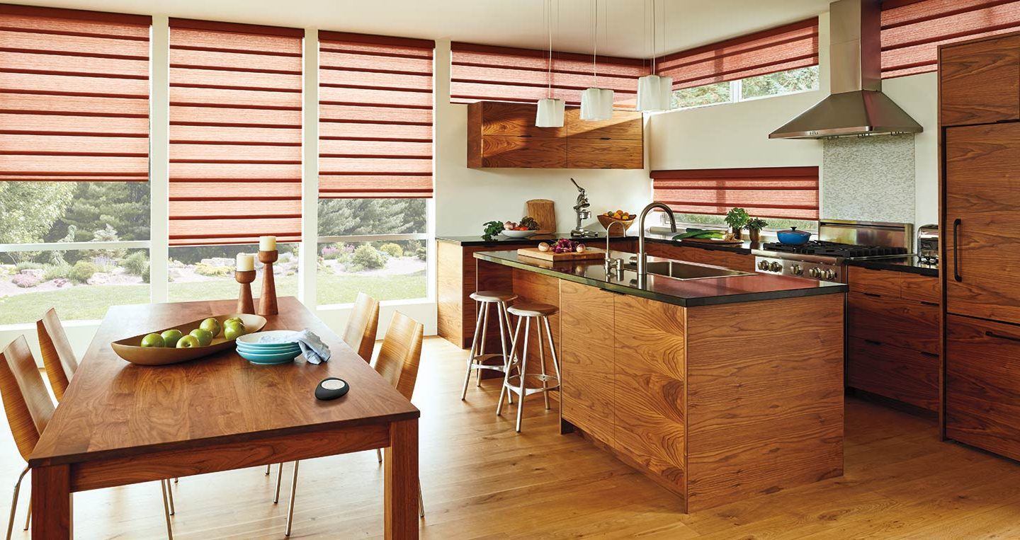 Vignette® roman shades featured in a kitchen white wooden cabinetry