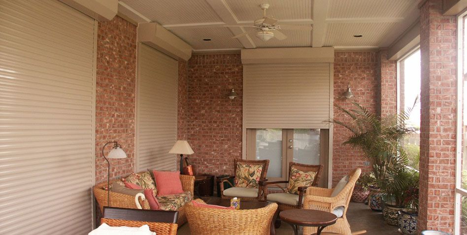 an outdoor patio displaying beige security shutters