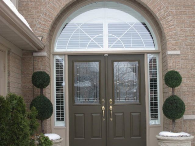 Sunwood shutters in front entrance door windows